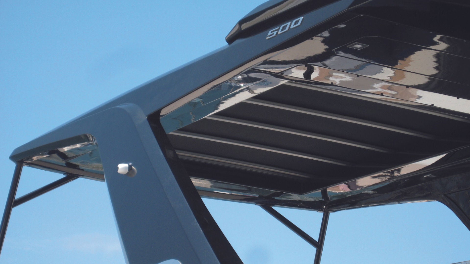 Bottom view of Webasto Folding Shade folding sunroof installed on boat