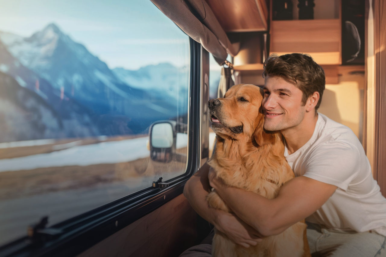 Man with dog in an RV with air heater